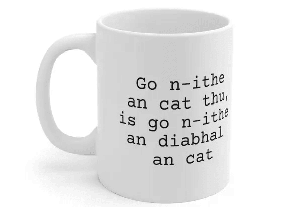 Go n-ithe an cat thu, is go n-ithe an diabhal an cat – White 11oz Ceramic Coffee Mug